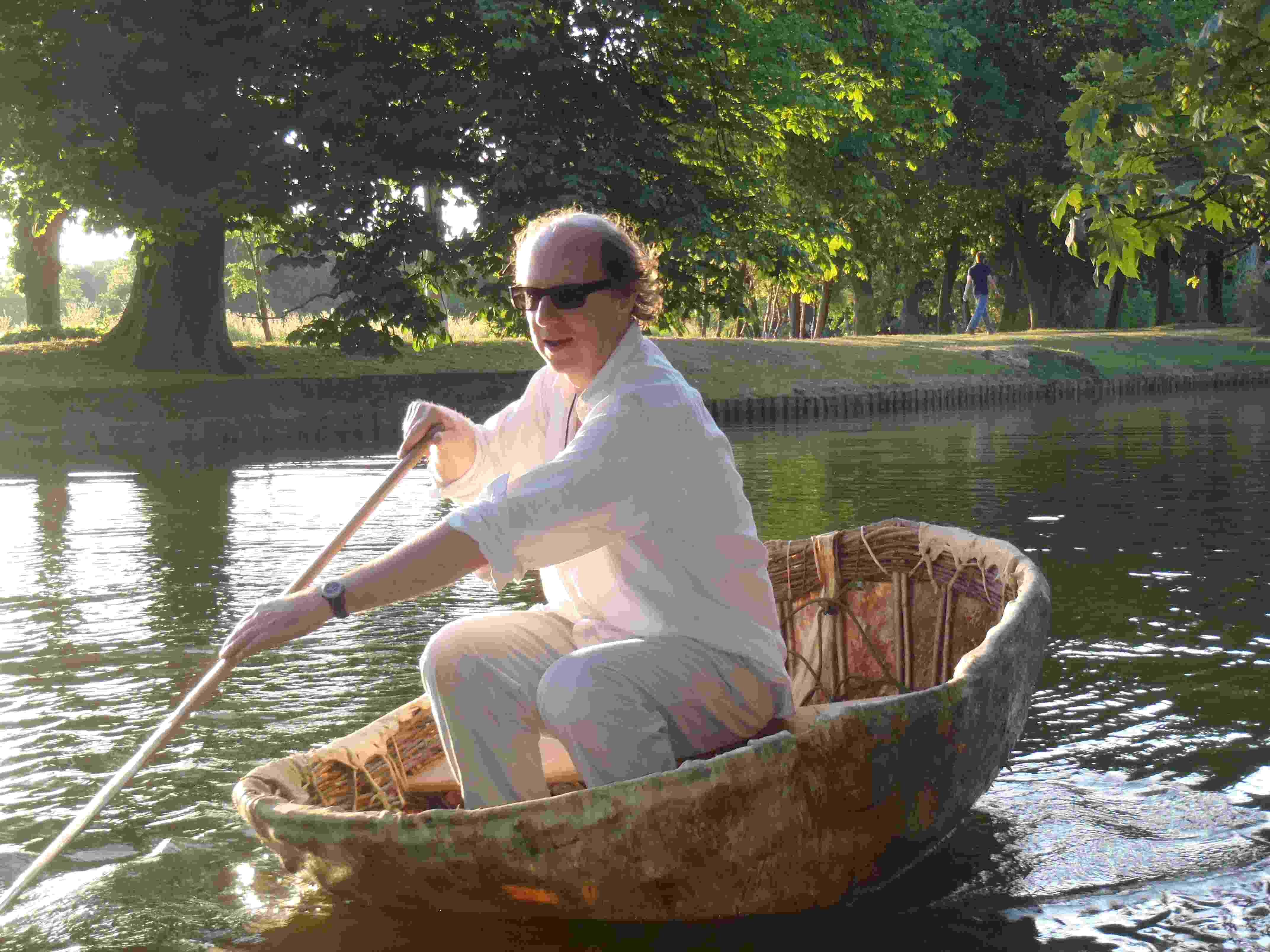Sam in a coracle