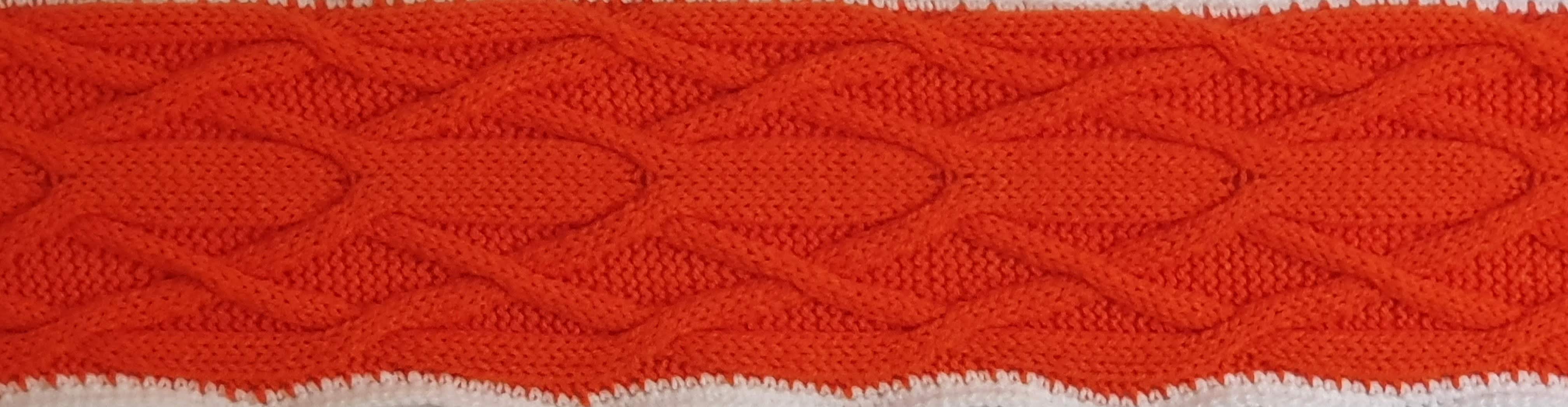 Orange with a central band that forks into two and then crosses on the outside edge