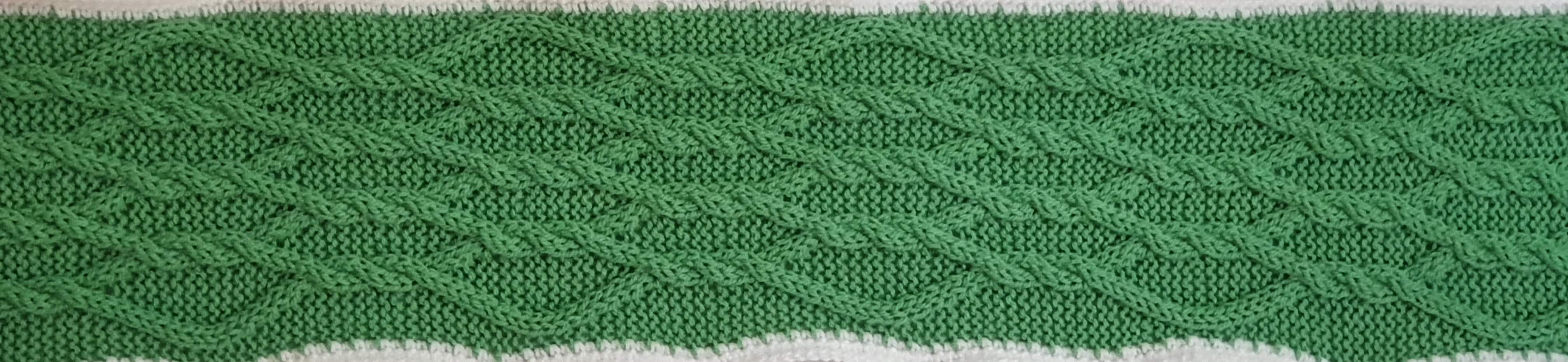 Green with 8 strands in a lattice, but each cross is achieved with twisting two strands three times