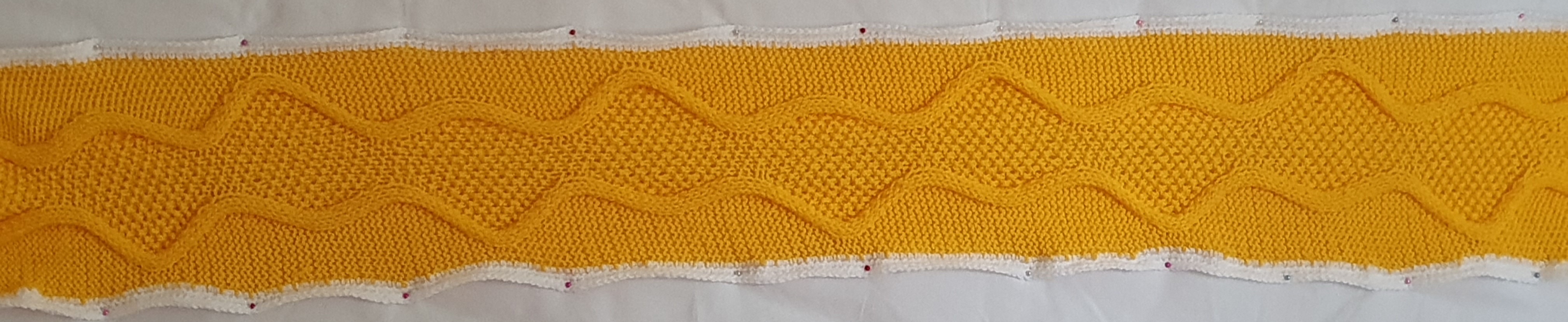 Yellow with two undulating waves along the length, each alternately large wave and shallow wave, reflected and out of phase so large wave on one is opposite shallow wave on other