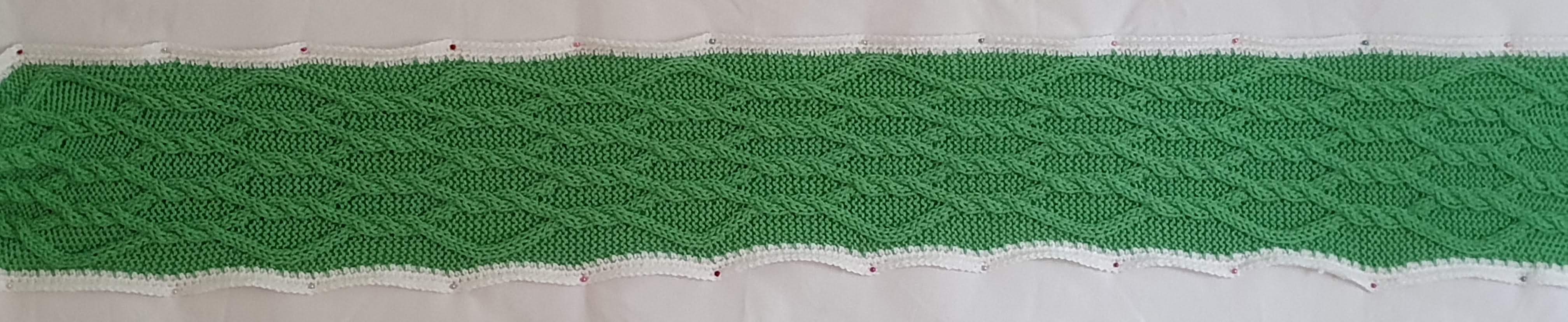 Green with 8 strands in a lattice, but each cross is achieved with twisting two strands three times